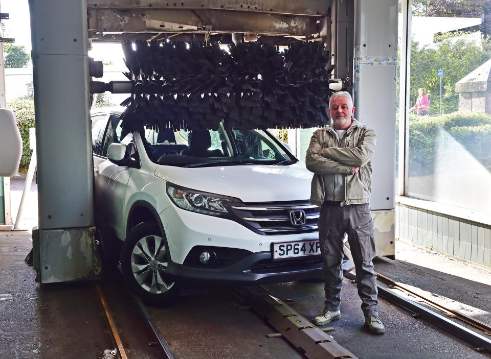 Kenny Macfarlane's wife and daughter were trapped inside the Honda at the car wash in Glasgow. (Reach)