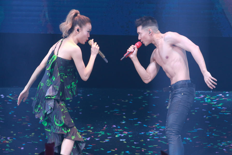 HONG KONG, CHINA - SEPTEMBER 14: Singers Joey Yung (L) and Kenny Kwan perform on the stage in concert on September 14, 2019 in Hong Kong, China. (Photob by VCG/VCG via Getty Images)