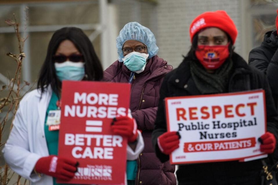 Nurses of the New York State Nurses Association attend a press conference on the Covid-19 public health crisis engulfing Jacobi Medical Center and other New York health hospital facilities on January 13, 2022 in New York City. (Photo by ANGELA WEISS / AFP) (Photo by ANGELA WEISS/AFP via Getty Images)