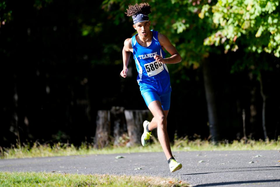 Joshua Tejada, of Teaneck, is shown on his way to a first place finish, in the National boys race starts at, Darlington County Park, in Mahwah.  Thursday, September, 29, 2022