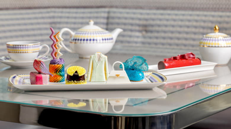 Colorful modern cakes with tea cups