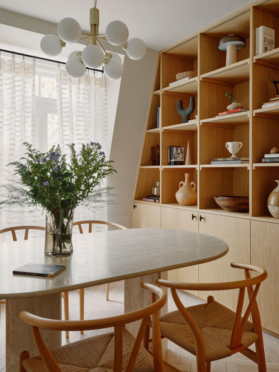 A bespoke bookshelf that slots into a sloping ceiling