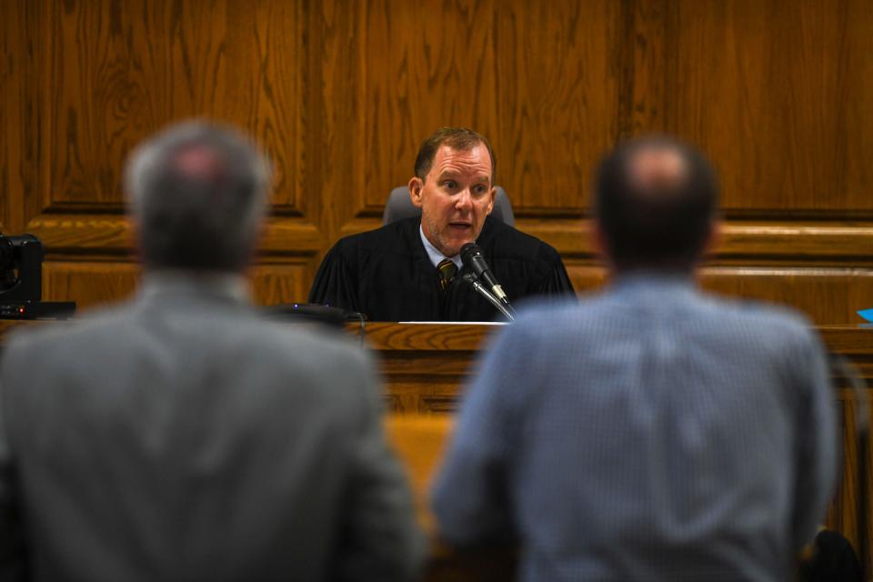 Judge Kyle Atkins reads out loud the consequences of accepting a best-interests plea to former Jackson Chief of Staff Alex Reed inside the Madison County Circuit Court in Jackson, Tenn., on Monday, July 15, 2024.