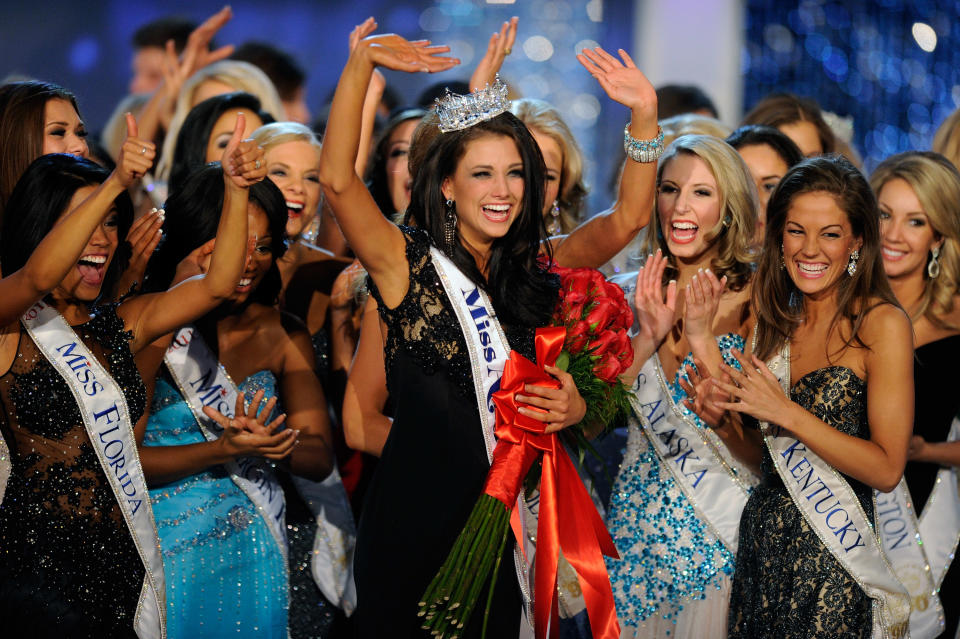 LAS VEGAS, NV - JANUARY 14: Laura Kaeppeler (C), Miss Wisconsin, is surrounded by fellow contestants after being crowned Miss America during the 2012 Miss America Pageant at the Planet Hollywood Resort & Casino January 14, 2012 in Las Vegas, Nevada. (Photo by Ethan Miller/Getty Images)