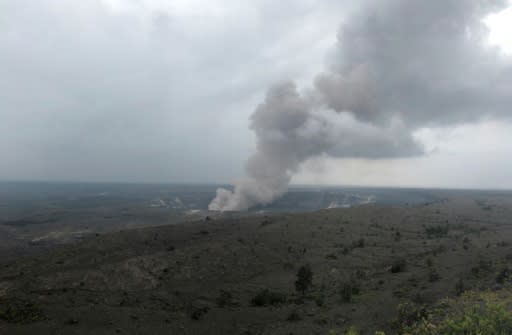 Smoke from the Kilauea volcano rises from the crater on the Big Island