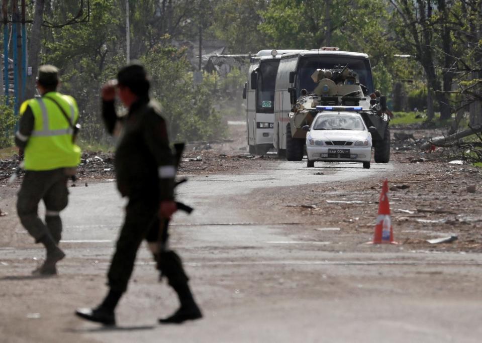 Buses carrying service members of Ukrainian forces (REUTERS)