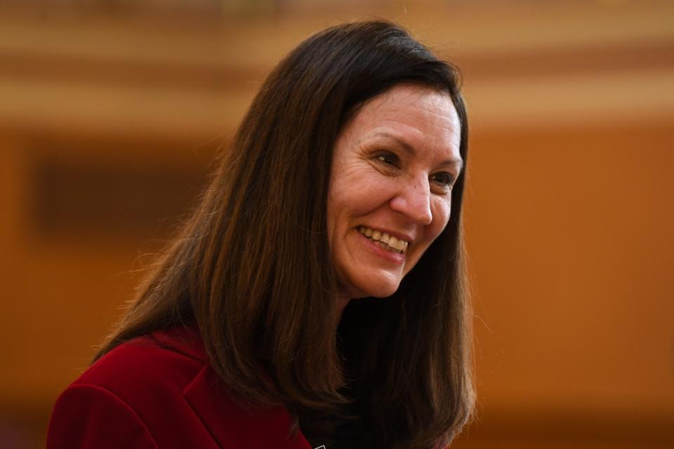 Senator Helene Duhamel speaks to other legislators and reporters after the annual budget address on Tuesday, Dec. 5, 2023 at the South Dakota State Capitol in Pierre.