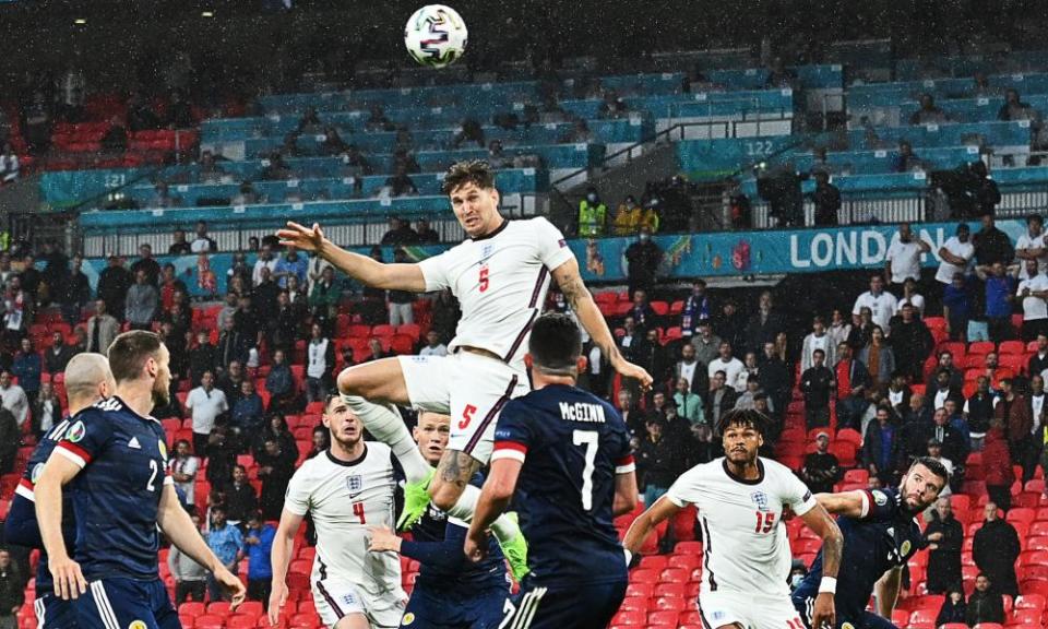 John Stones has a header from a corner – and hits a post