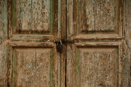 The locked door of a neighbourhood mosque is seen in Kashgar, Xinjiang Uighur Autonomous Region, China, March 23, 2017. Many smaller neighbourhood mosques have been closed by the authorities in favour of larger more centralised places of worship, locals and an analyst said. REUTERS/Thomas Peter