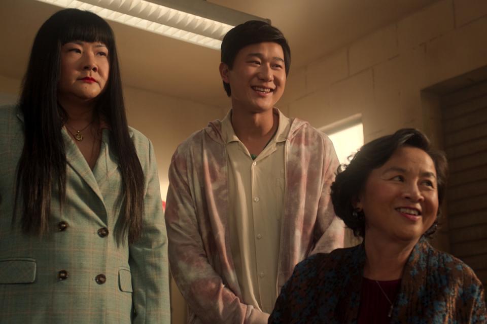 Xing (Jenny Yang) and Bruce (Sam Song Li) pay a visit to the mahjong aunties.<p>Photo: Michael Desmond/Courtesy of Netflix</p>