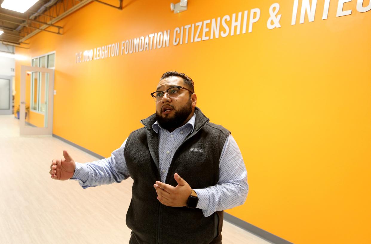 Executive Director Juan Constantino speaks about programs during a tour Dec. 7, 2022, at La Casa de Amistad in South Bend.