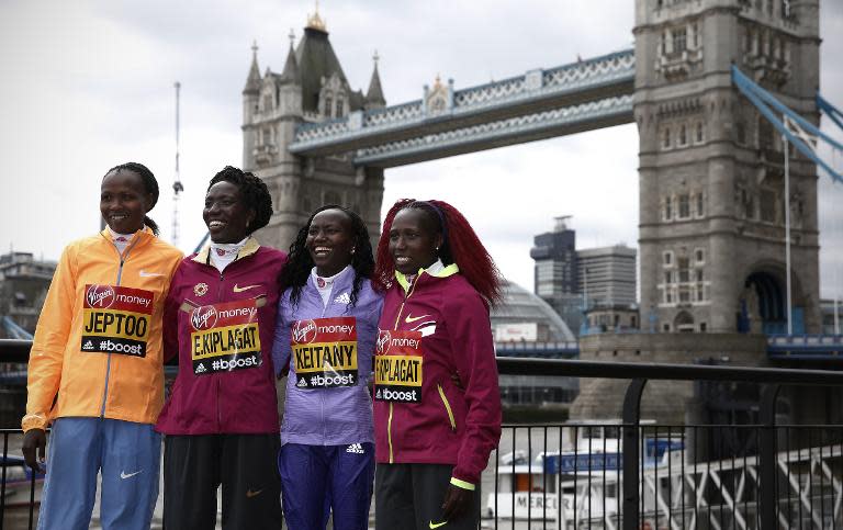 (From L) Kenya's Priscah Jeptoo, Edna Kiplagat, Mary Keitany and Florence Kiplagat pose for a photo outside the race headquarters at The Tower Hotel, ahead of the London Marathon, on April 22, 2015