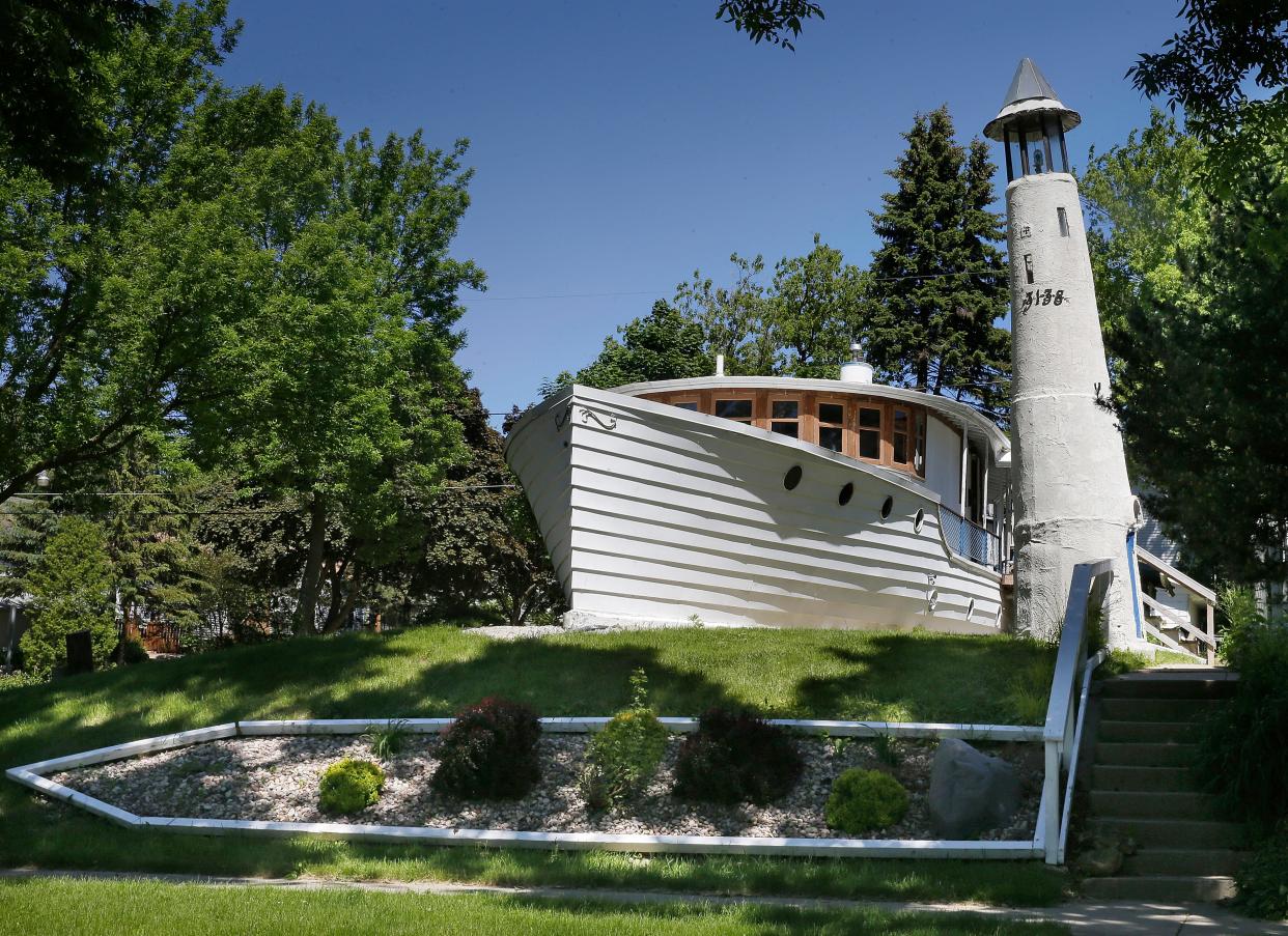 Cambridge Heights' "boathouse," described as a yacht bungalow, was purchased in 2018 by Steve Tilton and Nola Hitchcock Cross.