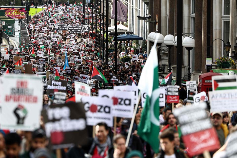 People take part in a 'March For Palestine', in London on Saturday to 