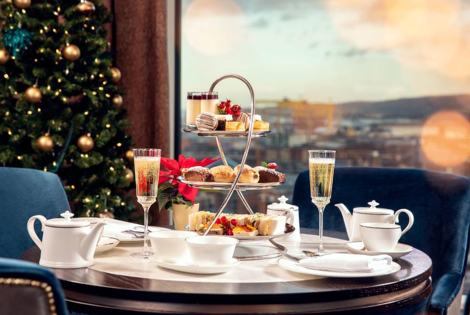 <p>You can relax, shop and celebrate the festive season with a Christmas city getaway at <a href="https://www.booking.com/hotel/gb/hastings-grand-central.en-gb.html?aid=2070935&label=christmas-hotels" rel="nofollow noopener" target="_blank" data-ylk="slk:Grand Central Belfast;elm:context_link;itc:0" class="link ">Grand Central Belfast</a>. You'll find yourself in the heart of the festivities when staying at this city centre hotel, the perfect base for exploring all the magical activities Belfast has to offer over Christmas. During this wonderful time of year, there's festive afternoon tea in the Observatory, champagne to sip throughout the period and plenty of festive treats.</p><p>On Christmas Day, you can start the morning with a long, lazy breakfast and a visit from Father Christmas, before relaxing in the Seahorse Lounge with family and friends. The Christmas Day Luncheon is a fabulous family feast combining the best local ingredients, from Glenarm salmon to Irish turkey. </p><p><a class="link " href="https://www.booking.com/hotel/gb/hastings-grand-central.en-gb.html?aid=2070935&label=christmas-hotels" rel="nofollow noopener" target="_blank" data-ylk="slk:CHECK AVAILABILITY;elm:context_link;itc:0">CHECK AVAILABILITY</a></p>