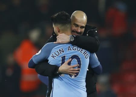 Britain Football Soccer - AFC Bournemouth v Manchester City - Premier League - Vitality Stadium - 13/2/17 Manchester City manager Pep Guardiola celebrates with Sergio Aguero after the game Reuters / Peter Nicholls