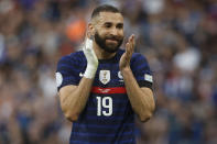 FILE - France's Karim Benzema, right, reacts during the UEFA Nations League soccer match between France and Denmark at the Stade de France in Saint Denis near Paris, France, Friday, June 3, 2022. (AP Photo/Jean-Francois Badias, File)