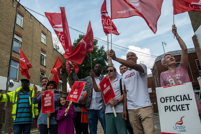 LONDON, ENGLAND - Bus drivers on the picket line at Stamford Brook bus garage as a two day strike called by the UNITE trade union begins over pay on August 28, 2022 in London, England. Trade union Unite said 1,600 drivers at bus company London United would strike on Sunday and Monday in a move expected to impact the Notting Hill Carnival. (Photo by Guy Smallman/Getty Images)