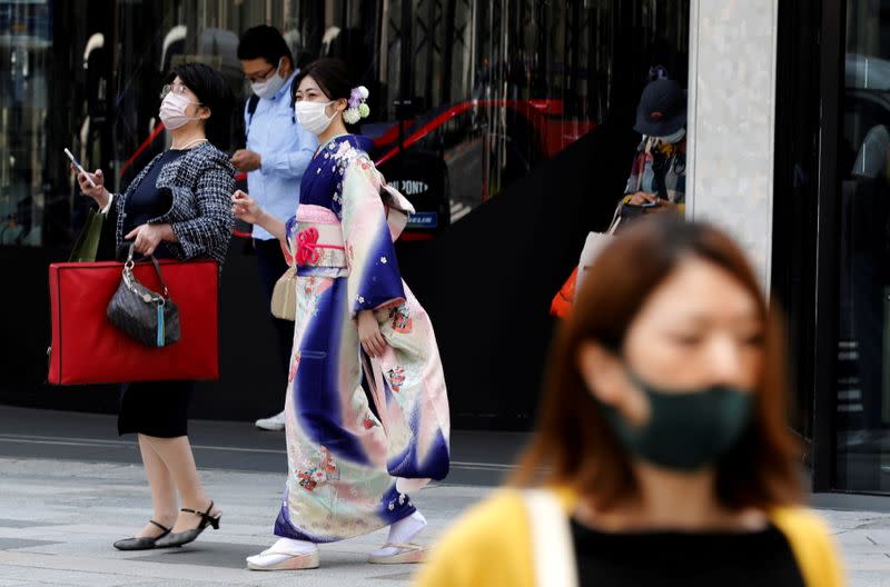 FILE PHOTO: The first day of Japan's third state of emergency in Tokyo