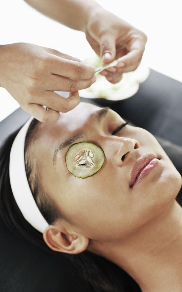 Woman receiving facial at Rebab Spa, Kayumanis Gan