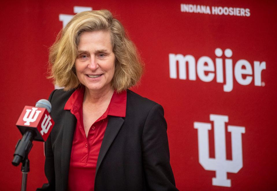 Indiana University President Pamela Whitten, pictured introducing new head football coach Curt Cignetti in December 2023, is under fire for decisions her administration has made in recent months.