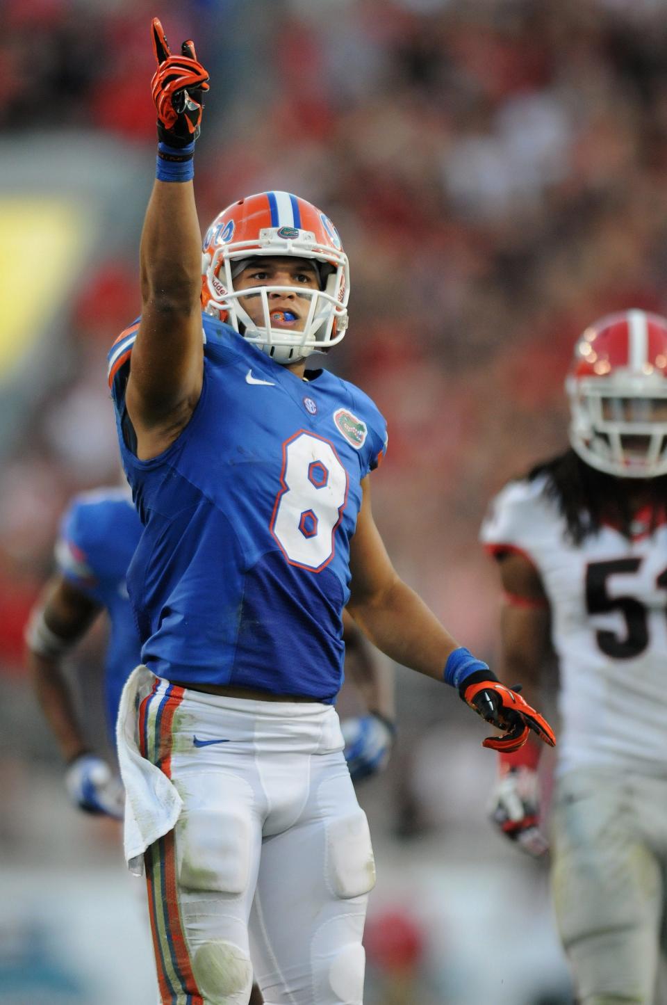 Trey Burton celebrates a first down for the Florida Gators in the 2013 game against Georgia at TIAA Bank Field.
