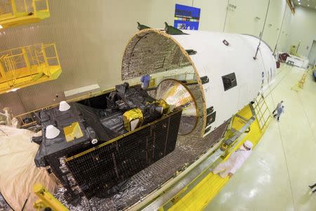 The ExoMars 2016 spacecraft composite, comprised of the Trace Gas Orbiter and Schiaparelli, is seen during the encapsulation within the launcher fairing at the Baikonur cosmodrome, Kazakhstan, in this handout photo released by European Space Agency (ESA) on March 2, 2016. REUTERS/Boris Bethge/ESA/Handout via Reuters