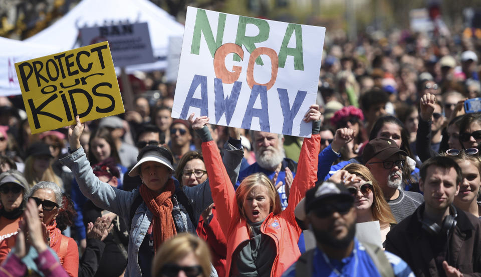 FILE - In this March 24, 2018, file photo, crowds of people participate in the March for Our Lives rally in support of gun control in San Francisco. The National Rifle Association is declaring victory after San Francisco Mayor London Breed told city departments to ignore part of a resolution labeling the NRA a "terrorist organization." The resolution approved by the Board of Supervisors in September 2019 directs the city to assess ties between its contractors to the NRA. The NRA said Tuesday, Oct. 1, 2019, that Breed was backing down and the memo was a "clear concession" in response to its lawsuit over the resolution. (AP Photo/Josh Edelson, File)