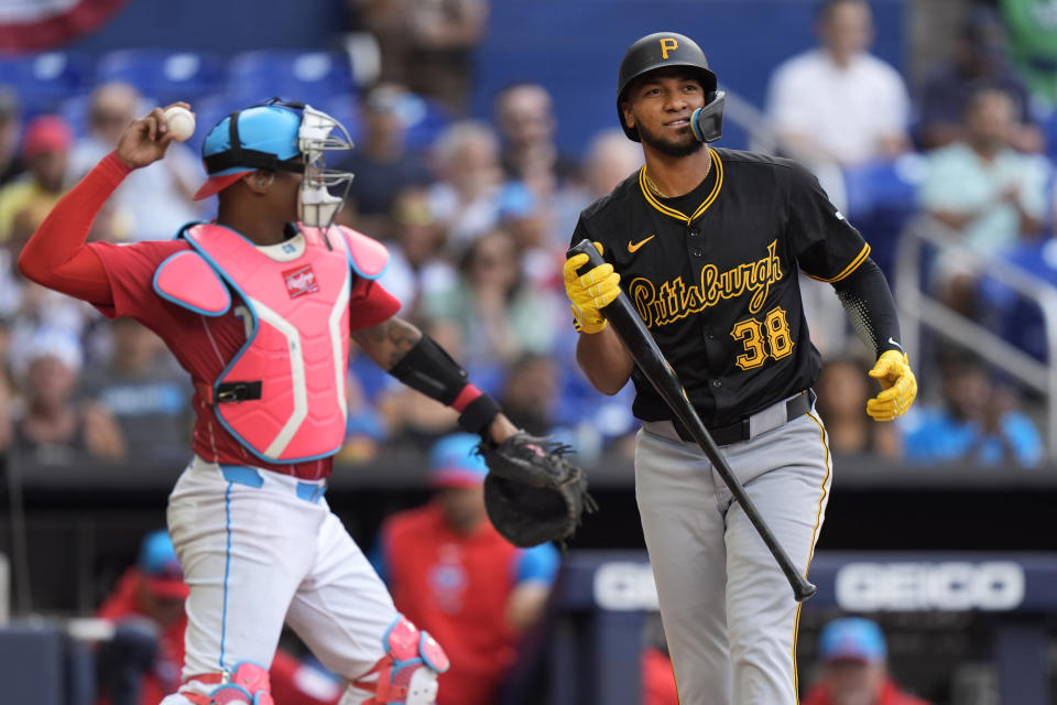 Pittsburgh Pirates' Edward Olivares (38) reacts after striking out swinging during the first inning of a baseball game against the Miami Marlins, Saturday, March 30, 2024, in Miami. (AP Photo/Wilfredo Lee)