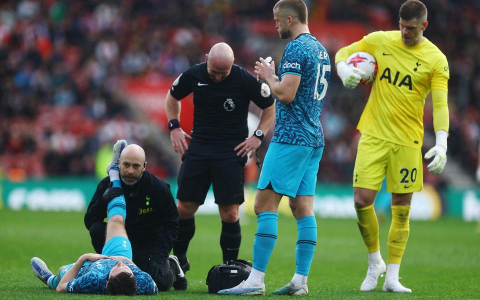 Tottenham Hotspur's Ben Davies receives medical attention after sustaining an injury - Reuters/Paul Childs