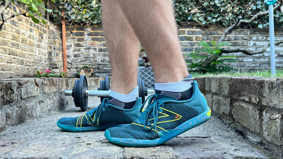 Man wearing a pair of the New Balance Minimus TR cross training shoes