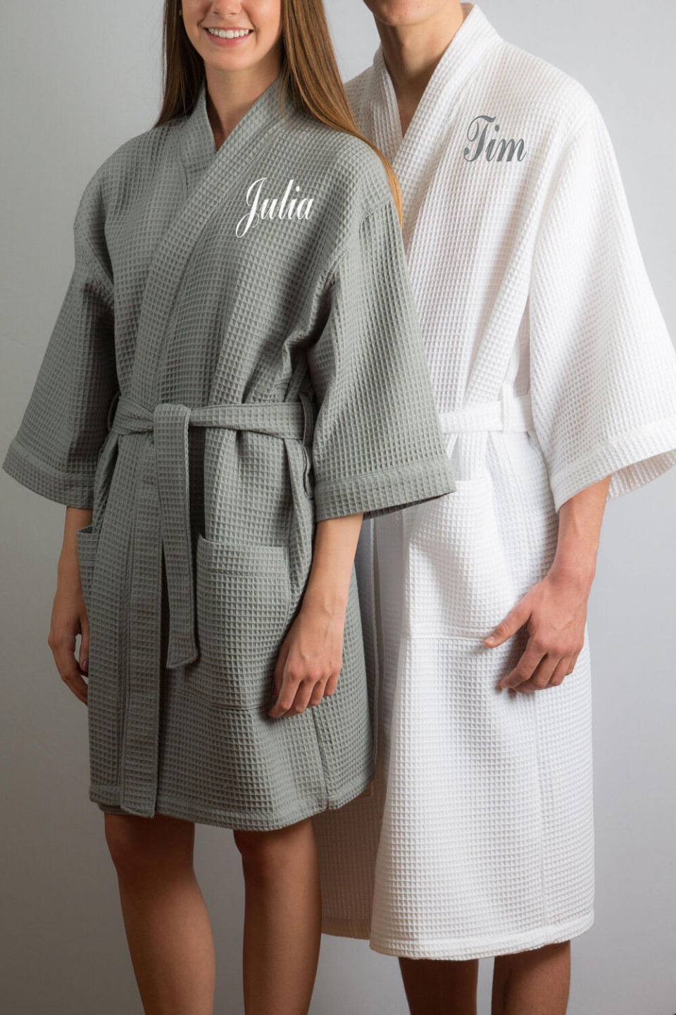 Keep it personal with these personalized robes for your favorite couple. <a href="https://fave.co/2MZhoV5" target="_blank" rel="noopener noreferrer">Get the set at Etsy</a>.