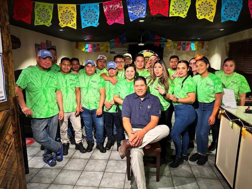 Marco Puerto (seated) is the owner of Cocina Mexicana Bar & Grill. He was named 2024 Restaurateur of the Year by the Memphis Restaurant Association.