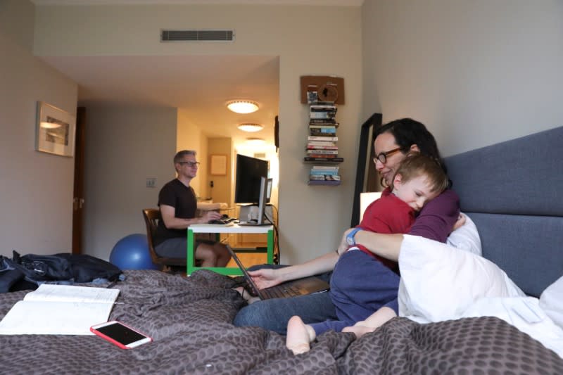 Naomi and her husband Doug Hassebroek work from home with their children in Brooklyn, New York, as New York public schools statewide close due to public health concerns over the rapid spread of coronavirus