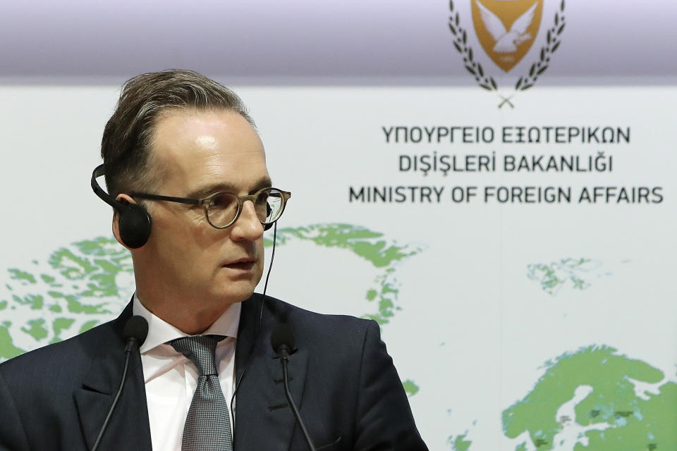 German Foreign Minister Heiko Maas talks to the media during a press conference with his Cyprus' counterpart Nicos Christodoulides at the foreign ministry house in divided Nicosia, Cyprus, Tuesday, Oct. 13, 2020. Maas is in Cyprus for a one-day visit. (AP Photo/Petros Karadjias)