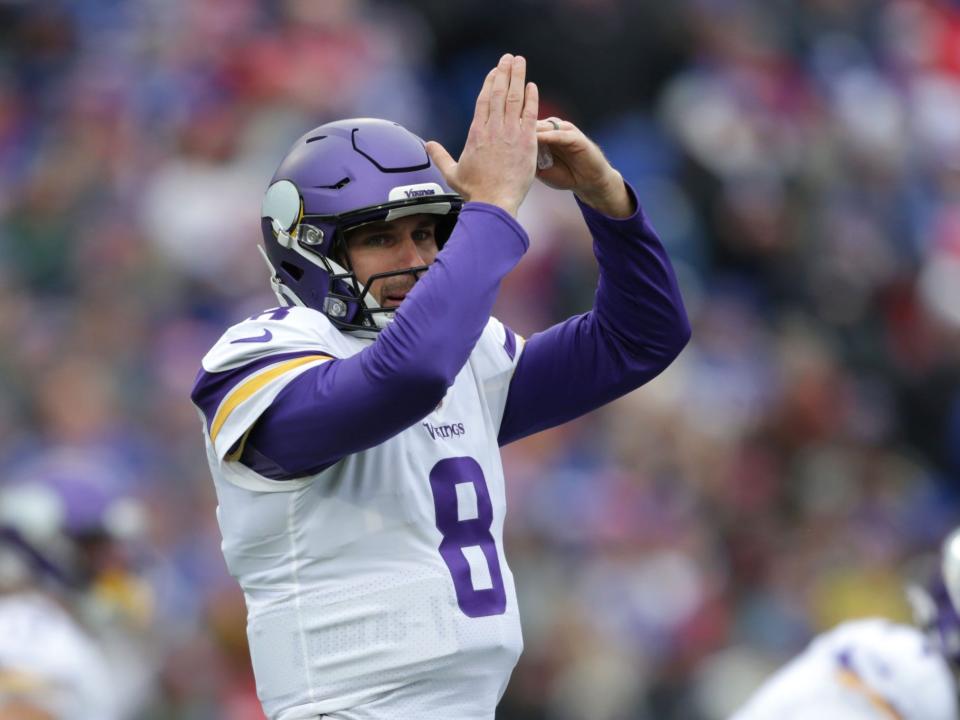 Kirk Cousins calls a timeout during a game against the Buffalo Bills.