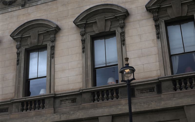 FILE PHOTO: A street lamp illuminates the windows of the Garrick Club, a private member's club in London