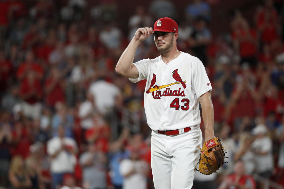 St. Louis Cardinals starting pitcher Dakota Hudson walks to the dugout after being removed during the seventh inning of a baseball game against the Milwaukee Brewers, Monday, Aug. 19, 2019, in St. Louis. (AP Photo/Jeff Roberson)