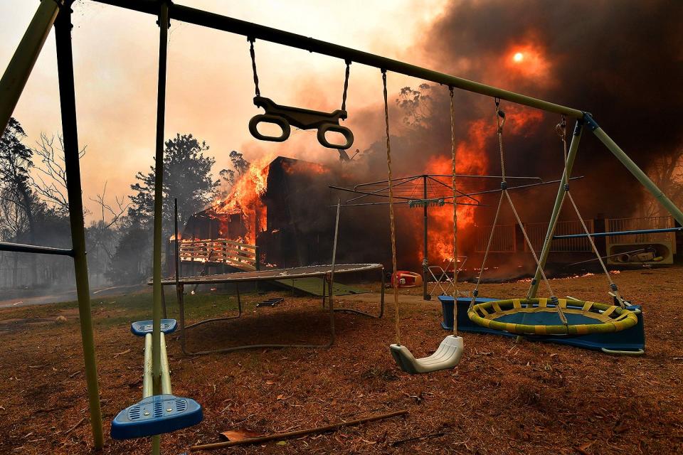 A home blazes in a bushfire on Hassall Road in New South Wales, Buxton, Australia on Dec. 19, 2019.