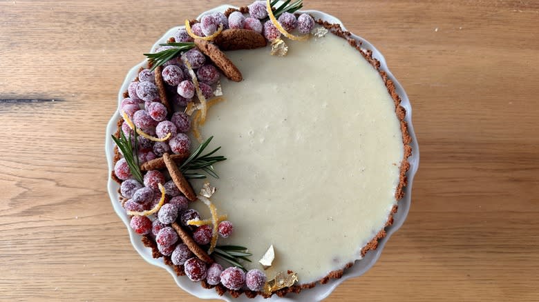 white chocolate cranberry tart with festive garnish