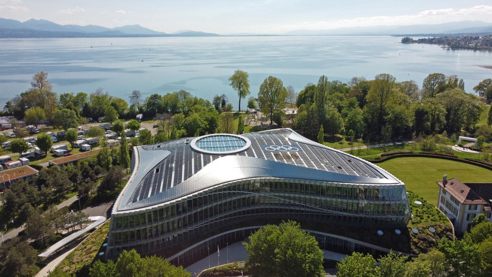 The Olympic rings are pictured on top of the IOC headquarters in Lausanne