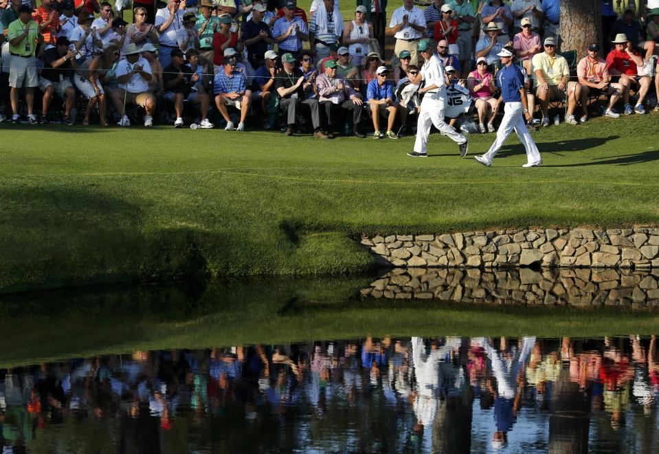 U.S. golfer Bubba Watson walks on the 15th hole during the third round of the Masters golf tournament at the Augusta National Golf Club in Augusta