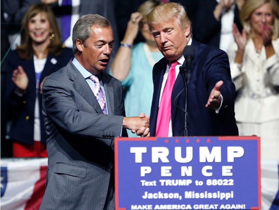 Donald Trump welcomes pro-Brexit leader Nigel Farage at a campaign rally in Jackson, Miss., in August 2016. Farage is one of Trump's strongest U.K. supporters.