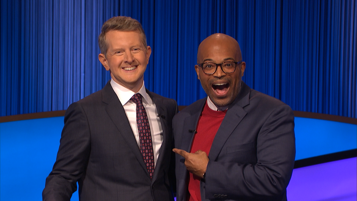 Columbus native Brandon Anderson, right, laughs with "Jeopardy!" host Ken Jennings.