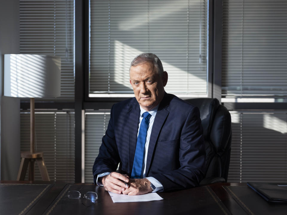 FILE - In this Thursday, Sept. 12, 2019 file photo, Blue and White party leader and former IDF chief of staff Benny Gantz poses for a portrait at his party headquarters, in Tel Aviv, Israel. Israel is heading to an unprecedented repeat election next week with no guarantee that the do-over vote will produce a more decisive result than an inconclusive one last April. (AP Photo/Oded Balilty, File)