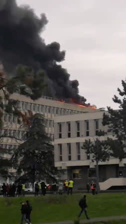 Fire breaks out on the rooftop of Lyon university, in Lyon, France January 17, 2019, in this still image obtained from a social media video. Twitter/ @PODEUS69 via REUTERS