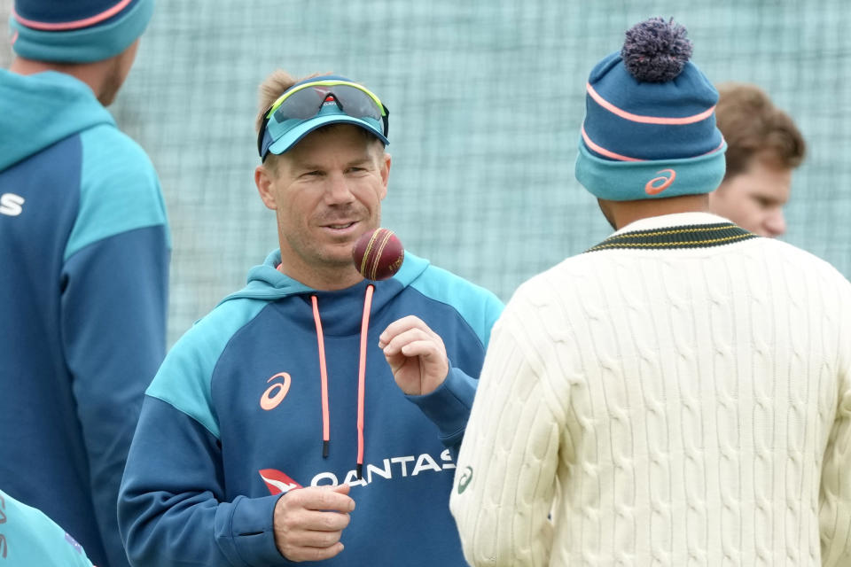 Australia's David Warner chats to team mates during a training session at The Oval cricket ground in London, Monday, June 5, 2023. Australia will play India in the World Test Championship 2023 Final at The Oval starting June 7. (AP Photo/Kirsty Wigglesworth)