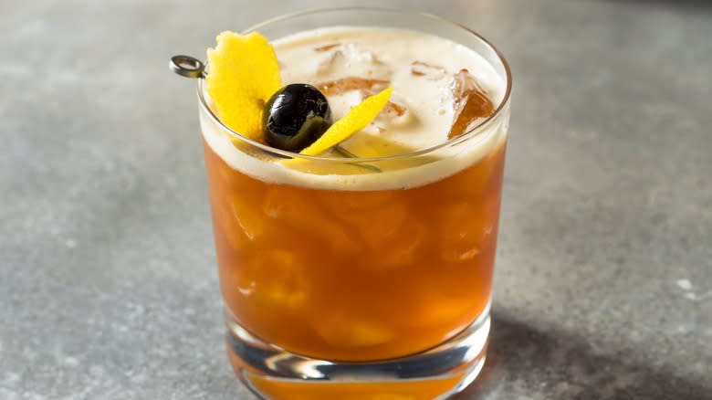 A whiskey sour cocktail on a counter