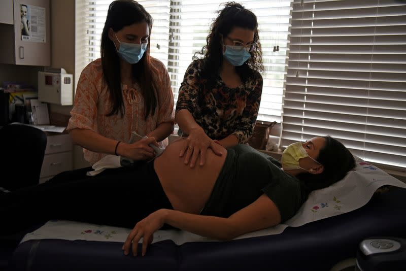 FILE PHOTO: Pregnant nurse continues working at a hospital in San Antonio despite coronavirus fears