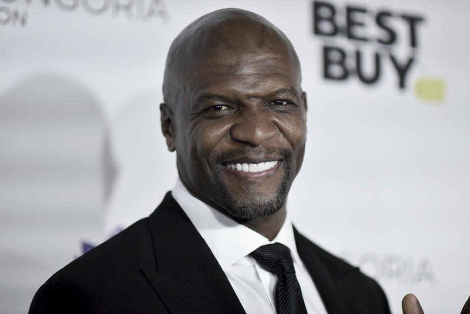 FILE - In this Nov. 15, 2019 file photo, Terry Crews attends the 2019 Eva Longoria Foundation Dinner Gala in Los Angeles. Stay-at-home orders, traveling fears and the cancellation of sporting events, concerts and theme parks have forced the Make-a-Wish foundation to come to a stand-still, leaving young people’s requests in holding patterns. The charity has introduced “Messages of Hope,” encouraging the public and celebrities to record inspiring messages and upload them to social media, and so far, stars like Crews have already participated. (Photo by Richard Shotwell/Invision/AP, File)